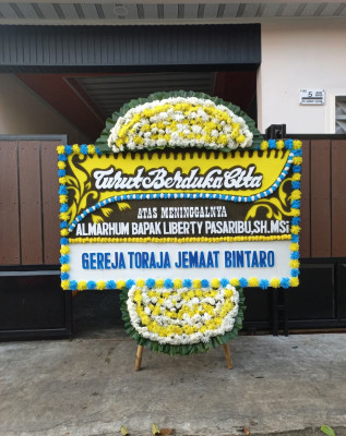 Papan Bunga Duka di Selesai
